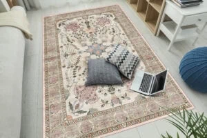 Stylish,Living,Room,With,Beautiful,Carpet,,Laptop,And,Pillows,On